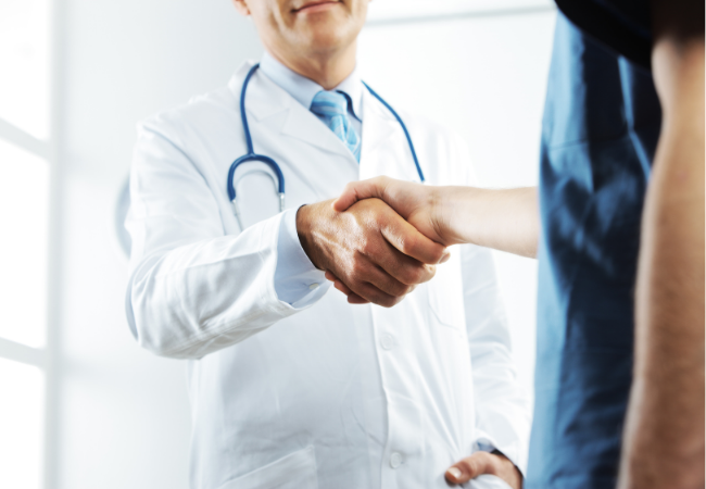 doctor shaking hands