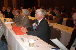 MSMS Organized Medical Staff members seated in a large conference room at long tables covered in a white cloth